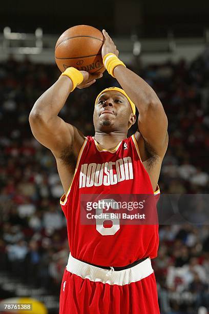Bonzi Wells of the Houston Rockets shoots a free throw against the Detroit Pistons on December 12, 2007 at the Toyota Center in Houston, Texas. The...