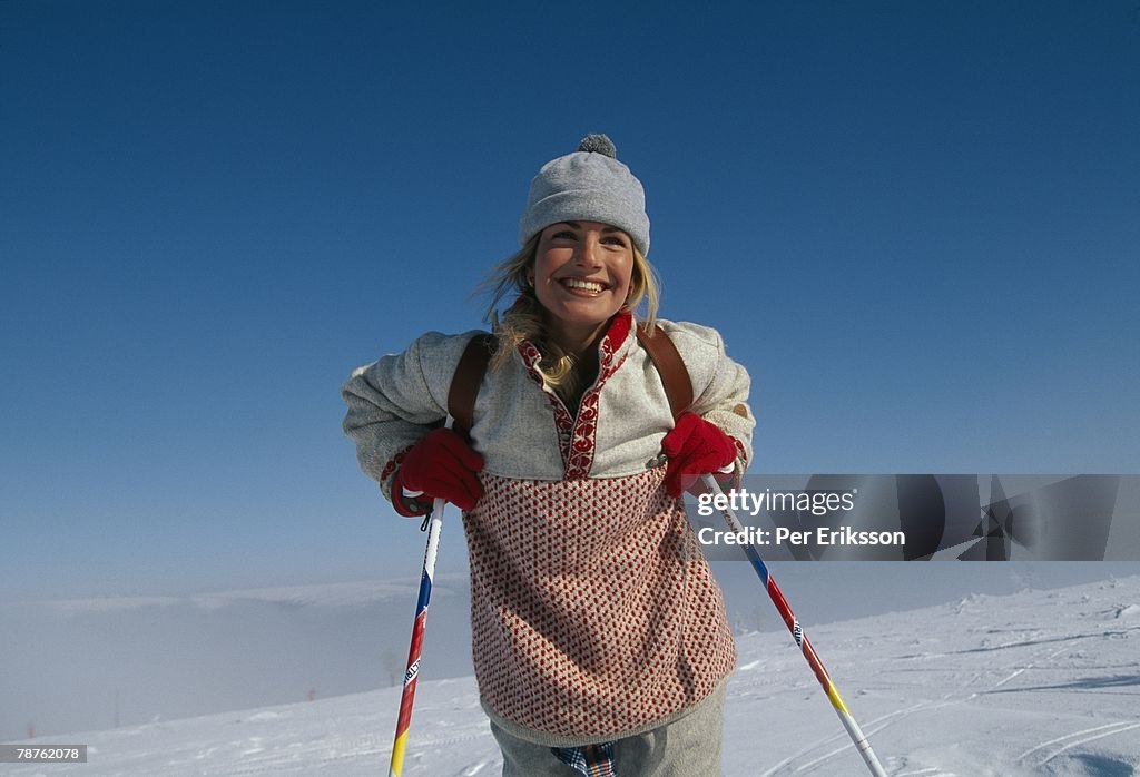 A smiling skier Sweden.