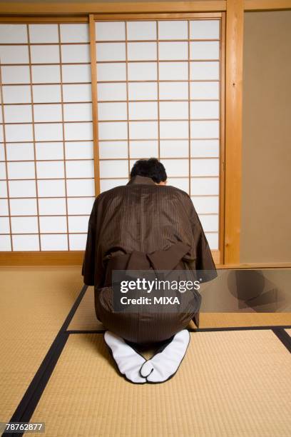 Bowing Rafter People Bowing Rear View Photos and Premium High Res Pictures - Getty Images