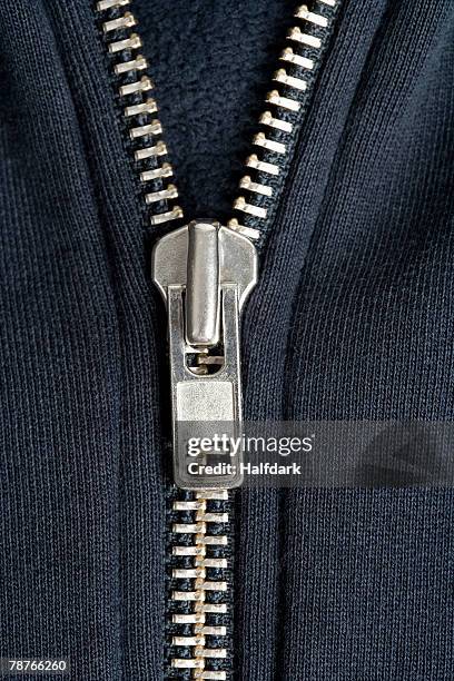 detail of a zipper on a sweatshirt - zip fotografías e imágenes de stock