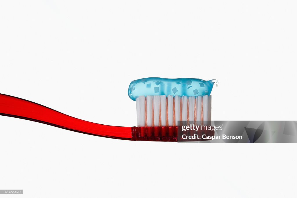 Toothbrush with blue toothpaste