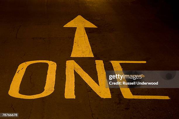 road markings on a one-way street - one way communication stock pictures, royalty-free photos & images