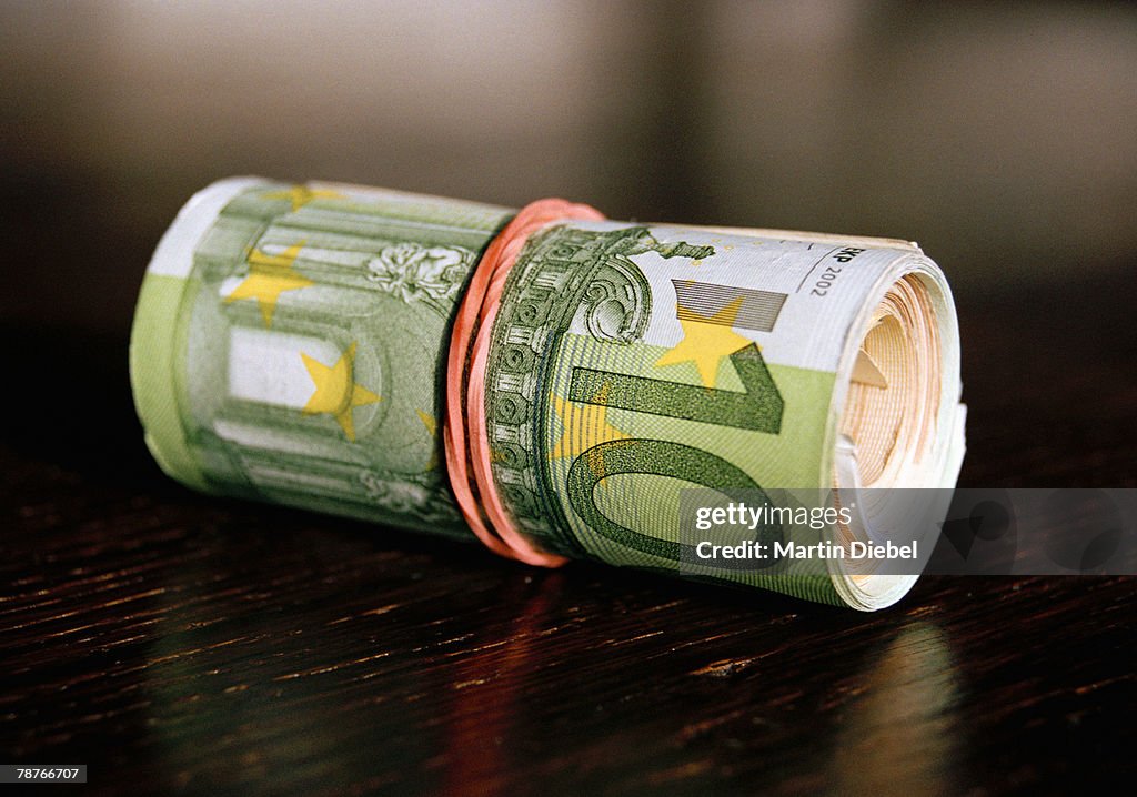 A roll of Euro banknotes