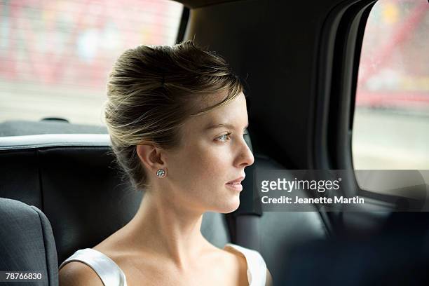 a bride sitting in a car - nervous bride stock pictures, royalty-free photos & images