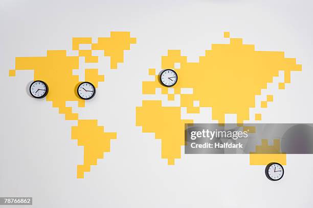 clocks on a world map - zone stock pictures, royalty-free photos & images