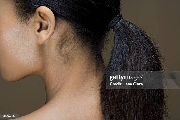 rear view of a woman's ponytail - human ear bildbanksfoton och bilder