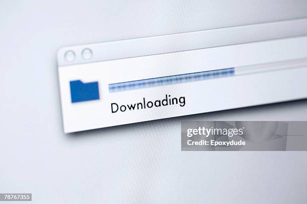 downloading message on a computer screen - downloading foto e immagini stock