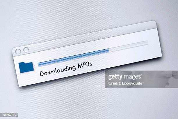 downloading message on a computer screen - mp3 gerät stock-fotos und bilder