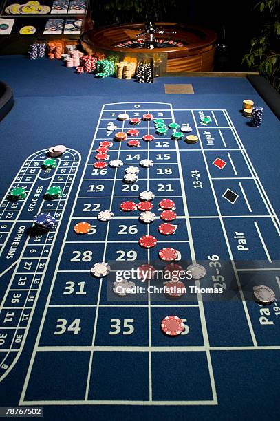 roulette table and wheel with bets placed - roulette table ストックフォトと画像