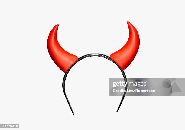 pair of toy devil horns - devil stock pictures, royalty-free photos & images