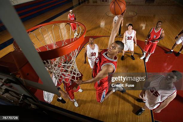 player taking shot - slam dunk stock pictures, royalty-free photos & images