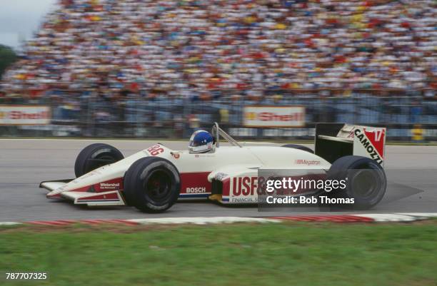 British racing driver Derek Warwick drives the USF&G Arrows Megatron Arrows A10B Megatron M12/13 1.5 L4t to finish in 4th place in the 1988 Brazilian...