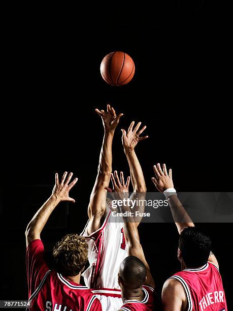 players trying to block shot - toy basketball hoop stock pictures, royalty-free photos & images