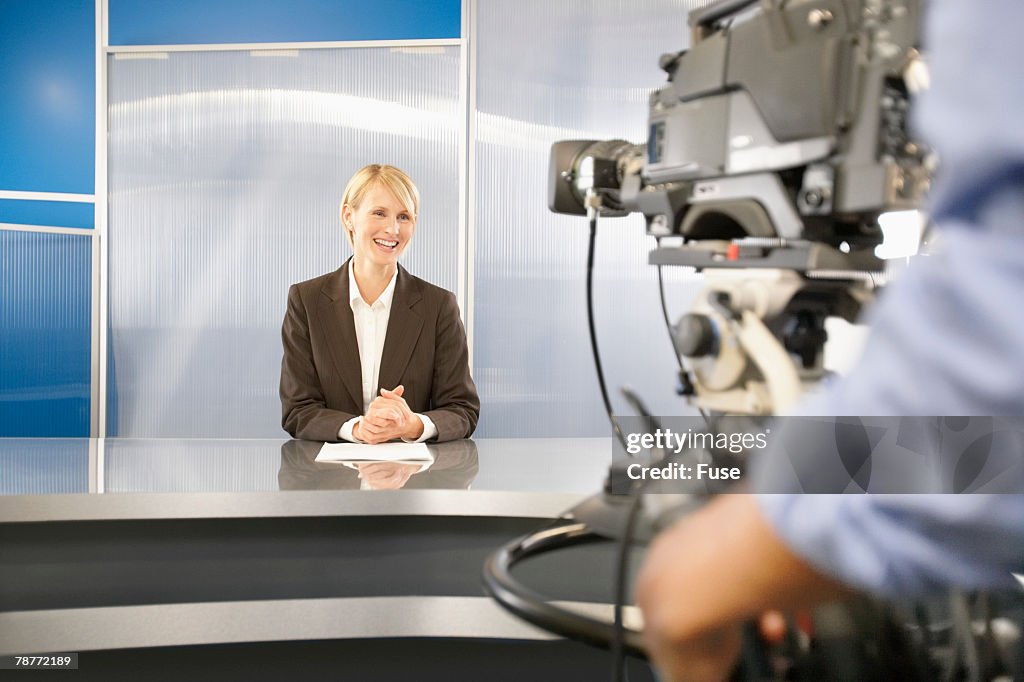 Newscaster in Television Studio