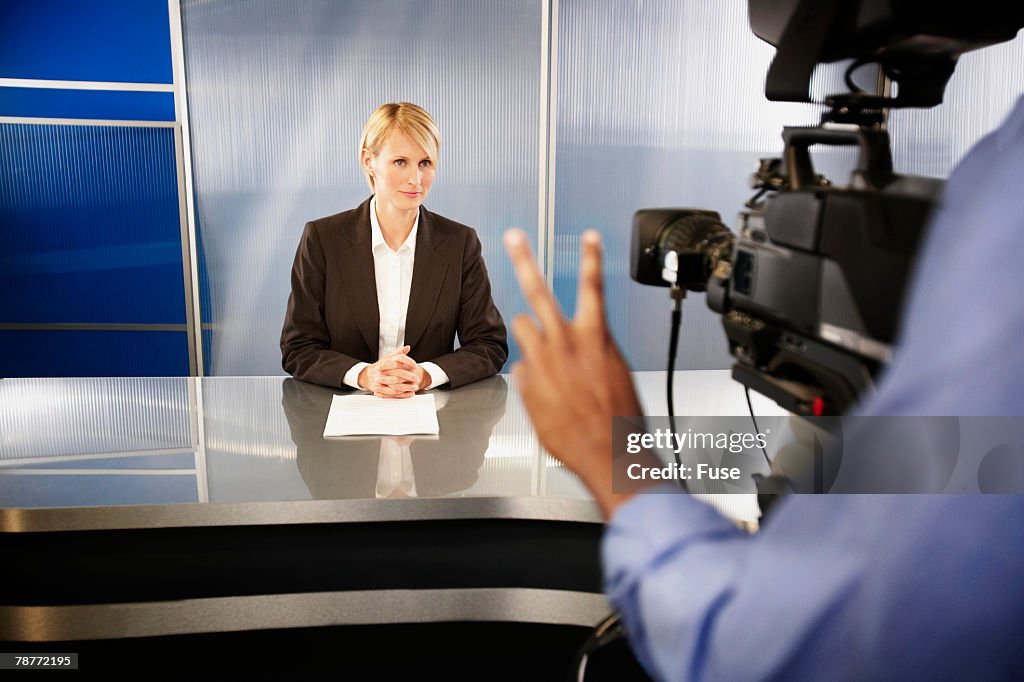 Newscaster in Television Studio