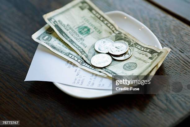 dollar bills and receipt - gratuity stock pictures, royalty-free photos & images