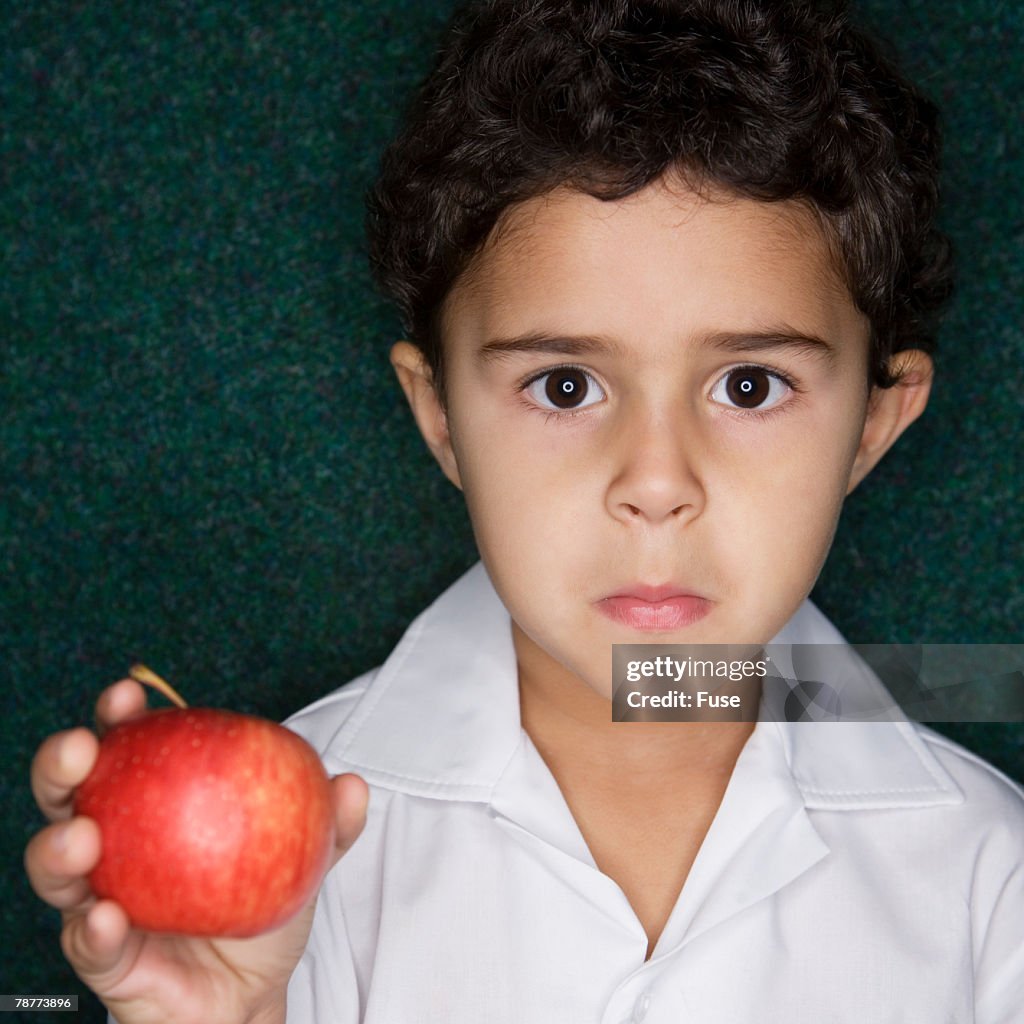 Boy Holding Apple