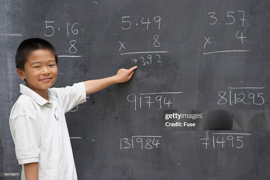 Boy Good At Math Boy Doing Math Problems High-Res Stock Photo - Getty Images
