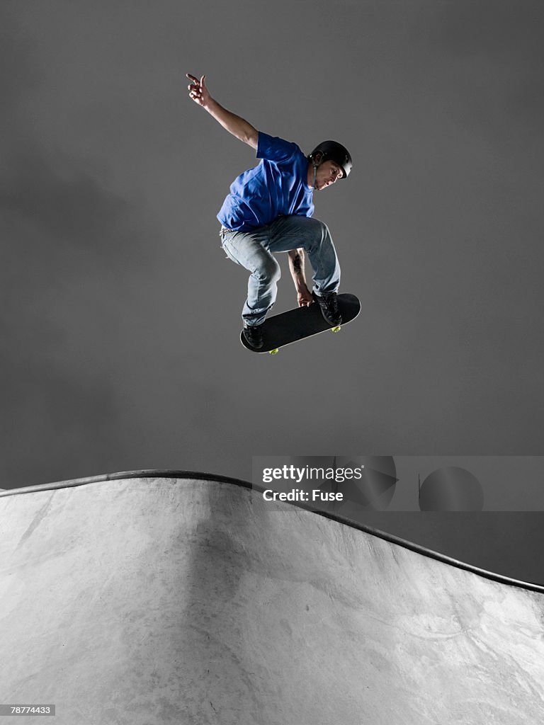 Skateboarder Performing Tricks