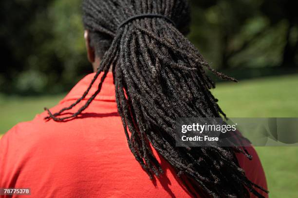 man with dreadlocks - rastafarian stock pictures, royalty-free photos & images