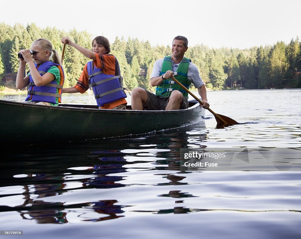 Father Canoeing with Kids