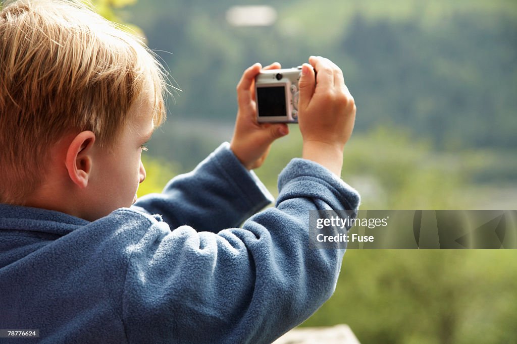 Boy Taking a Picture