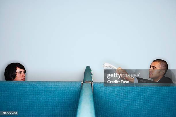 office worker transfering phone call - transfering stock pictures, royalty-free photos & images