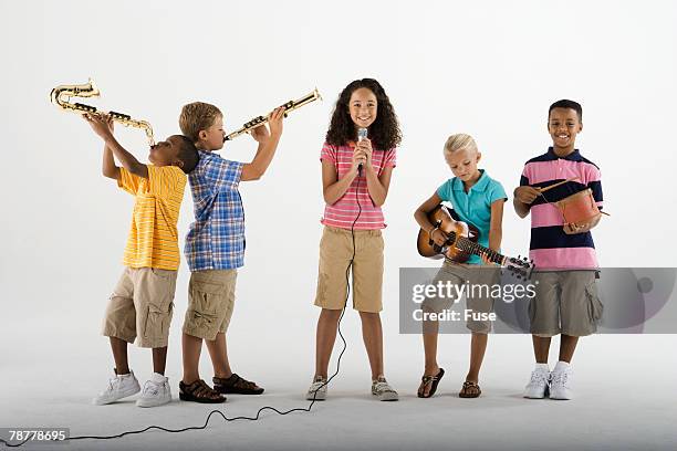 children in a band - acoustic guitar white background stock pictures, royalty-free photos & images