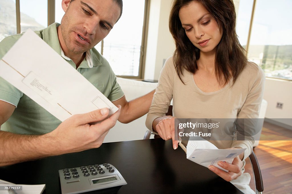 Couple at Home Organizing Finances