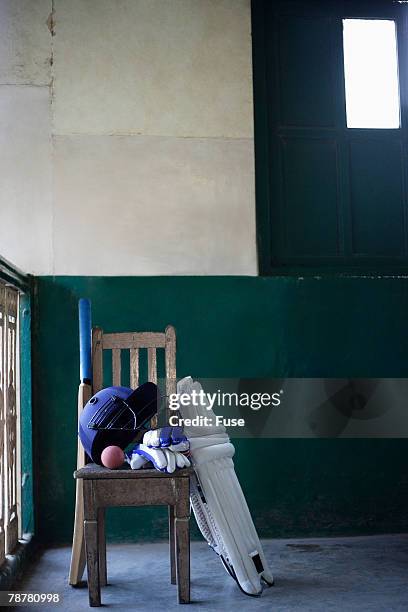 cricket equipment on chair - cricket bat stock pictures, royalty-free photos & images