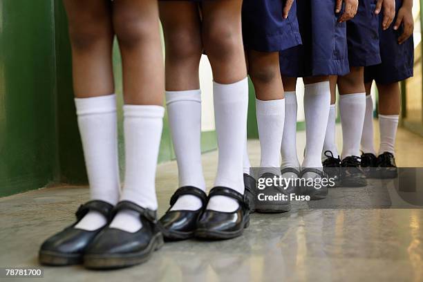 elementary students standing in a row - kids lining up stock pictures, royalty-free photos & images