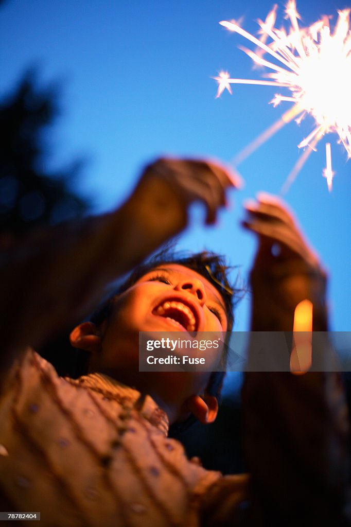 Boy Playing with a Sparkler