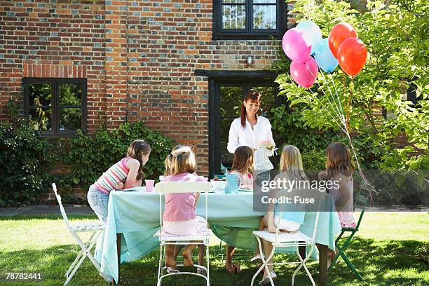 girls having a birthday party - attendee stock pictures, royalty-free photos & images