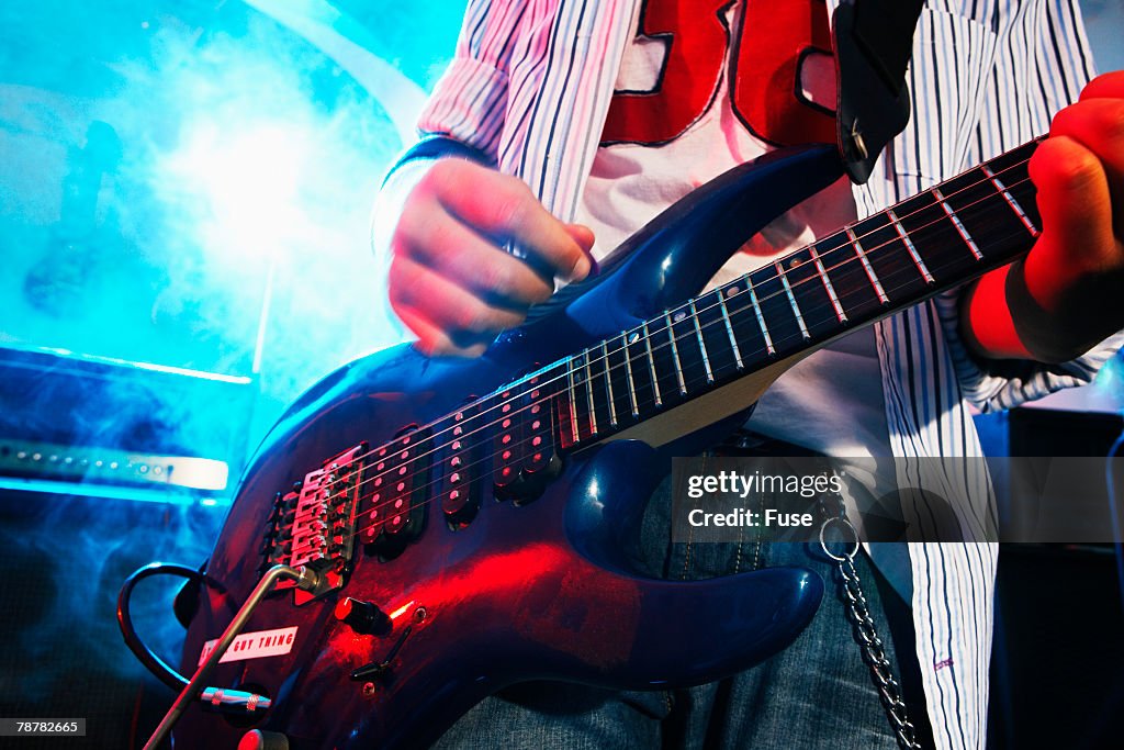 Teenager Playing Electric Guitar