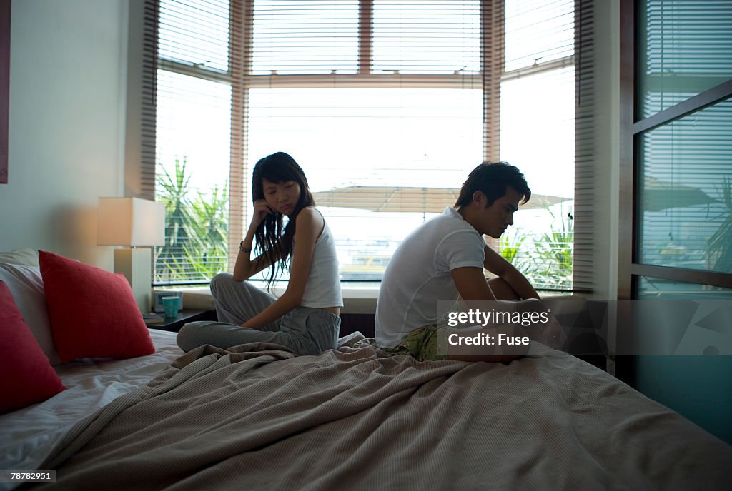 Asian Couple Waking Up