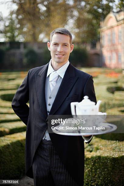 Butler Tea Ritual 59 Butler Serving Tea Stock Photos, High-Res Pictures, and Images ...