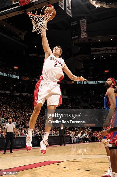 Andrea Bargnani of the Toronto Raptors makes a layup inside past Rasheed Wallace of the Detroit Pistons at the Air Canada Centre January 4, 2008 in...