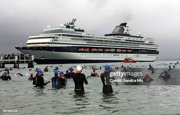 Swimmers enter the water for the start of the Port Of Tauranga Half Ironman Triathlon at Mount Maunganui on January 5, 2008 in Tauranga, New Zealand.