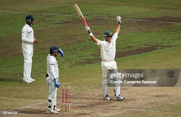 Matthew Hayden of Australia celebrates reaching his century during day four of the Second Test match between Australia and India at the Sydney...