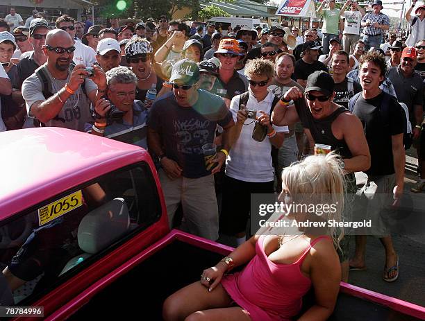 Group of on-lookers surround a vehicle with a woman in the back during Street Machine Summernats 21 Car Festival at Epic Park on January 5, 2008 in...