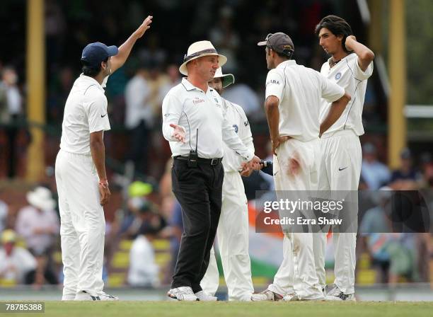 Indian players complain to umpire Mark Benson after the Australians were offered the light during day four of the Second Test match between Australia...