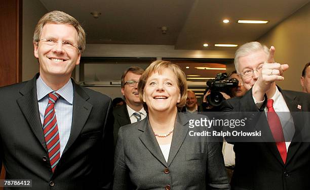 Christian Wulff, Governor of the German state of Lower Saxony, German Chancellor Angela Merkel and Roland Koch, Governor ofHesse arrive for a press...
