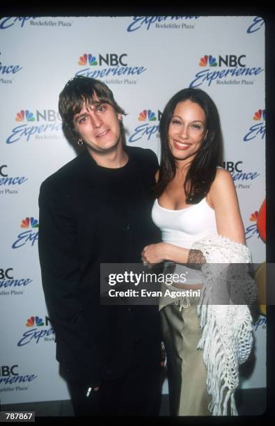 Singer Rob Thomas and Marisol pose for a picture May 13, 1999 at the opening of "NBC Experience" in New York City. The 70 minute tour tells the...