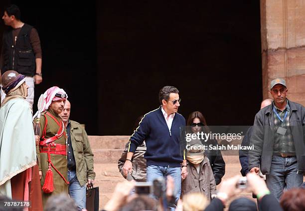 French President Nicolas Sarkozy and Carla Bruni, accompanied by her son Aurelien Enthoven, tour the ancient Nabatean city of Petra on January 05,...