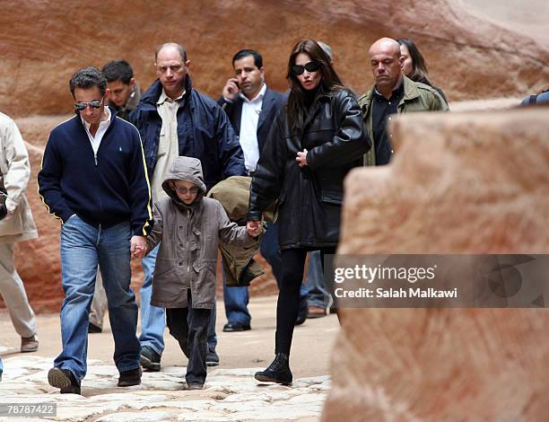 French President Nicolas Sarkozy and Carla Bruni, accompanied by her son Aurelien Enthoven, tour the ancient Nabatean city of Petra on January 05,...