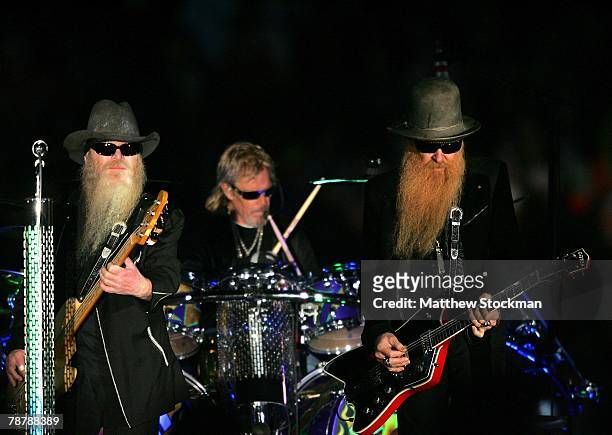 American Blues rock band ZZ Top performs at the half time show during the FedEx Orange Bowl between the Kansas Jayhawks and the Virginia Tech Hokies...