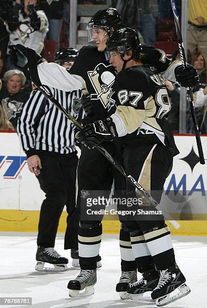 Sidney Crosby of the Pittsburgh Penguins celebrates his goal with Evgeni Malkin in the third period against the Florida Panthers on January 5, 2008...