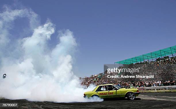 Car performs in the burnout competition during Street Machine Summernats 21 Car Festival at Epic Park on January 6, 2008 in Canberra, Australia....
