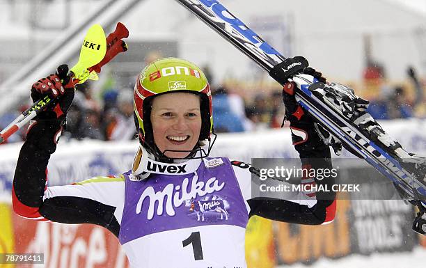 Austria's Marlies Schild celebrates her first place victory after the 2nd round of women's slalom in the FIS World cup in Spindleruv Mlyn, northern...