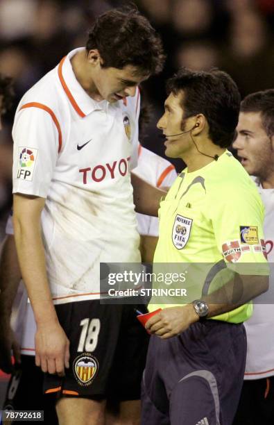 Valencia's Serbian Nikola Zigic argues with refere Rodriguez Santiago during a Spanish league football match against Levante at the Mestalla Stadium...
